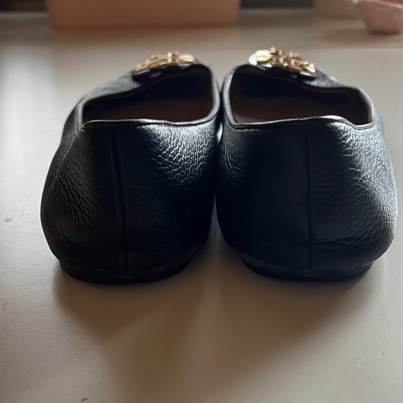 Tory Burch Black Flats with Gold Emblem - Picture 4 of 6
